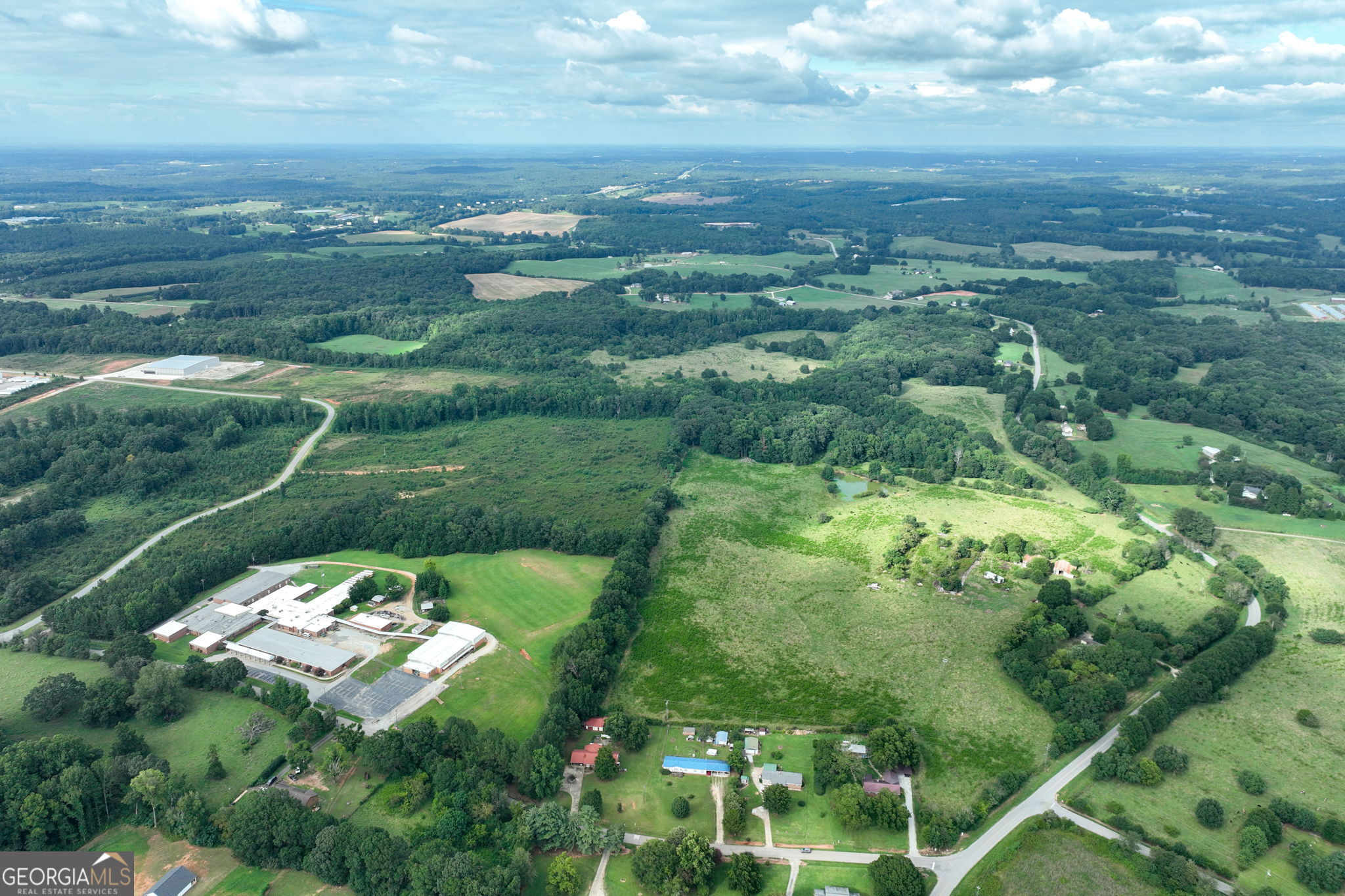 0 Turkey Creek Road Carnesville, GA 30521 - Photo 14 of 28 a view of a lake with a houses
