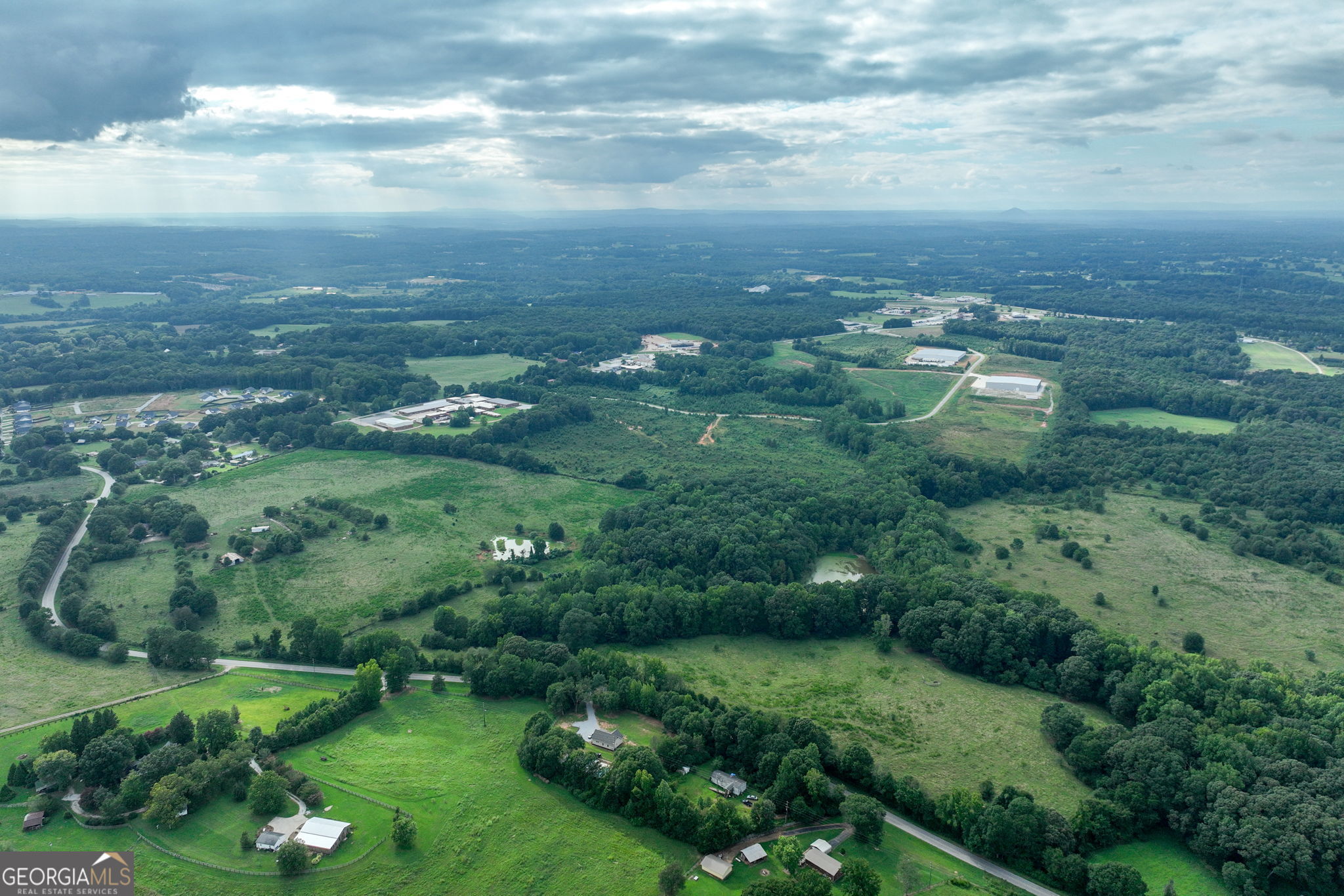0 Turkey Creek Road Carnesville, GA 30521 - Photo 8 of 28 an aerial view of residential houses with outdoor space and trees