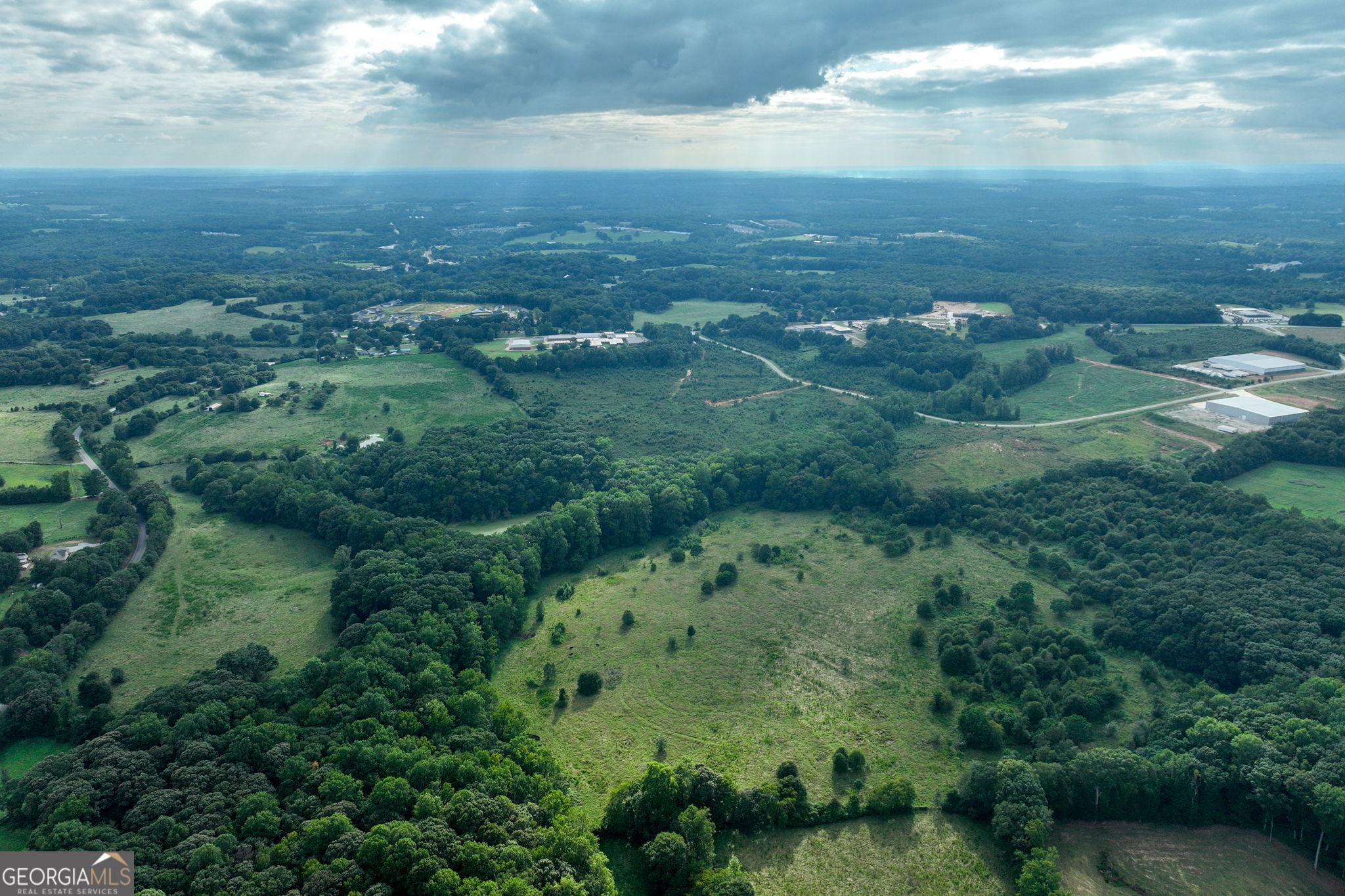 0 Turkey Creek Road Carnesville, GA 30521 - Photo 9 of 28 an aerial view of residential houses with outdoor space and trees