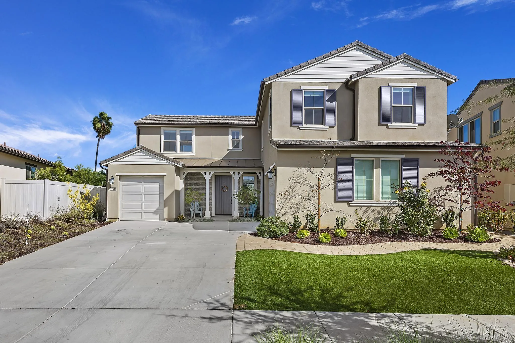 31657 Calle De Las Estrellas Bonsall, CA 92003 - Photo 2 of 30 a front view of a house with a yard