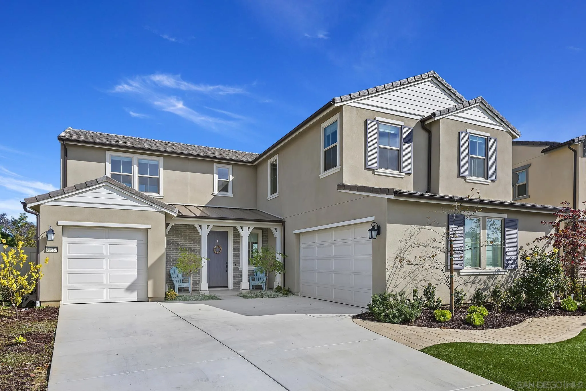 31657 Calle De Las Estrellas Bonsall, CA 92003 - Photo 3 of 30 a front view of a house with garden
