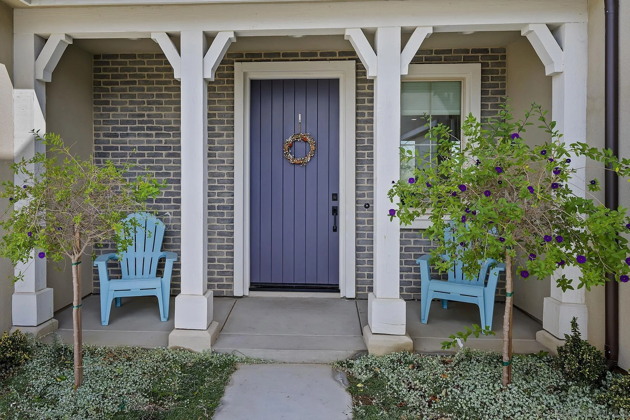 31657 Calle De Las Estrellas Bonsall, CA 92003 - Photo 4 of 30 a front view of a house with a tree