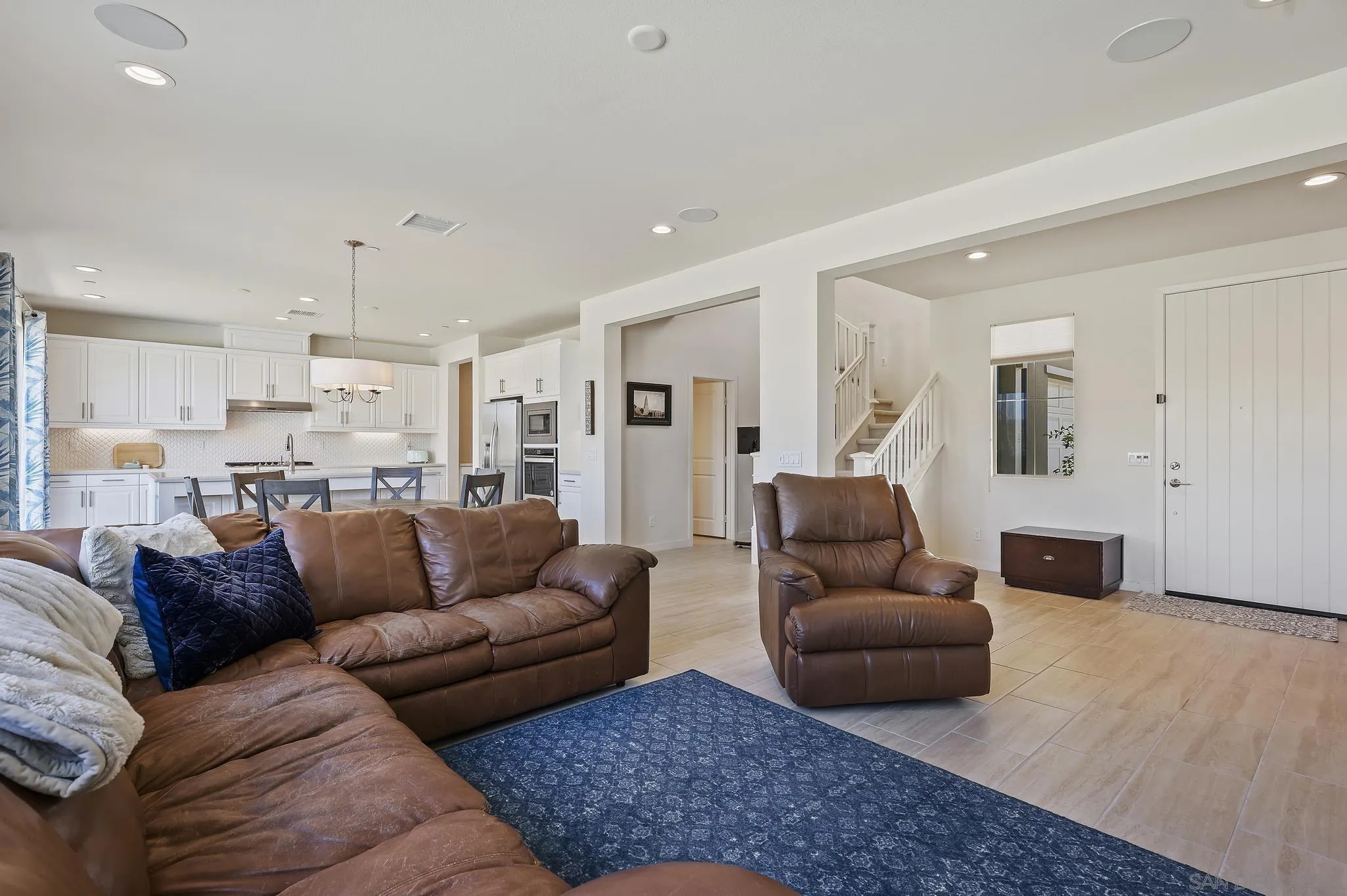 31657 Calle De Las Estrellas Bonsall, CA 92003 - Photo 8 of 30 a living room with furniture and a couch