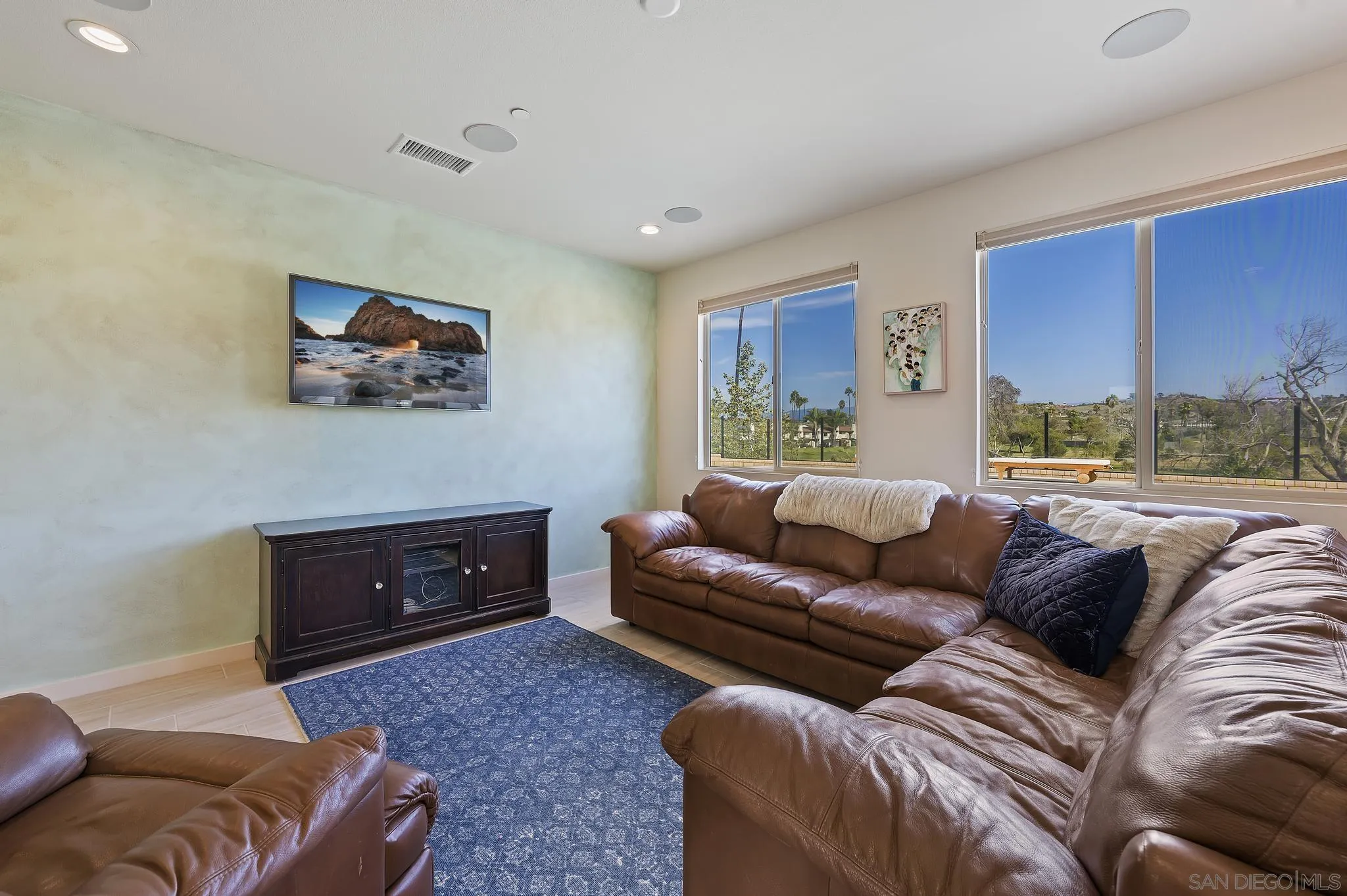 31657 Calle De Las Estrellas Bonsall, CA 92003 - Photo 9 of 30 a living room with furniture and a window