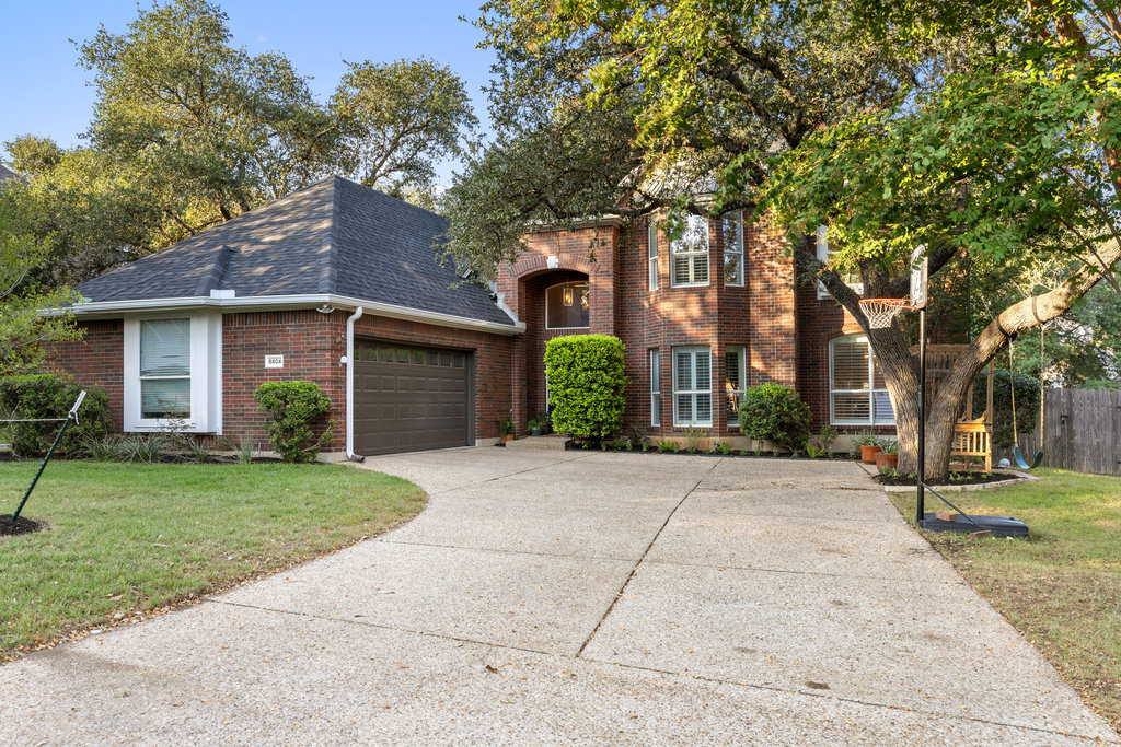 The side-entry garage offers plenty of space for cars, bikes, and everything that comes with busy life
