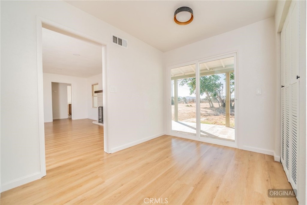 14387 Jicarilla Road Apple Valley, CA 92307 - Photo 7 of 24 Dining Area (Disclaimer: Some images have been digitally enhanced with virtual staging to illustrate potential room layouts and furnishings. Actual property condition and features may vary. Buyer to verify all information independently).
