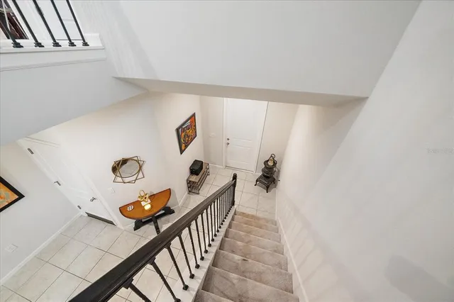 a view of a hallway with windows