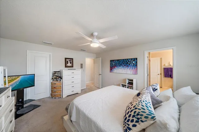 a bathroom with a shower and toilet