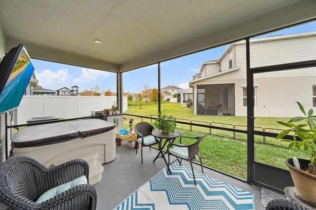 a view of a park with houses