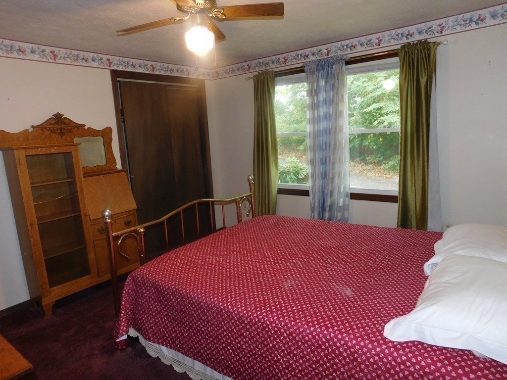 50 Bellvista Road Worcester, MA 01602 - Photo 14 of 20 a bedroom with a bed dresser and a window