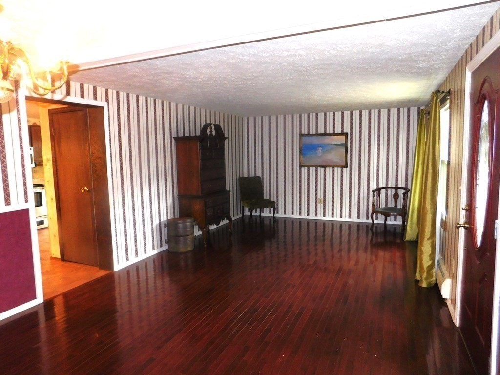 50 Bellvista Road Worcester, MA 01602 - Photo 9 of 20 an empty room with wooden floor and windows