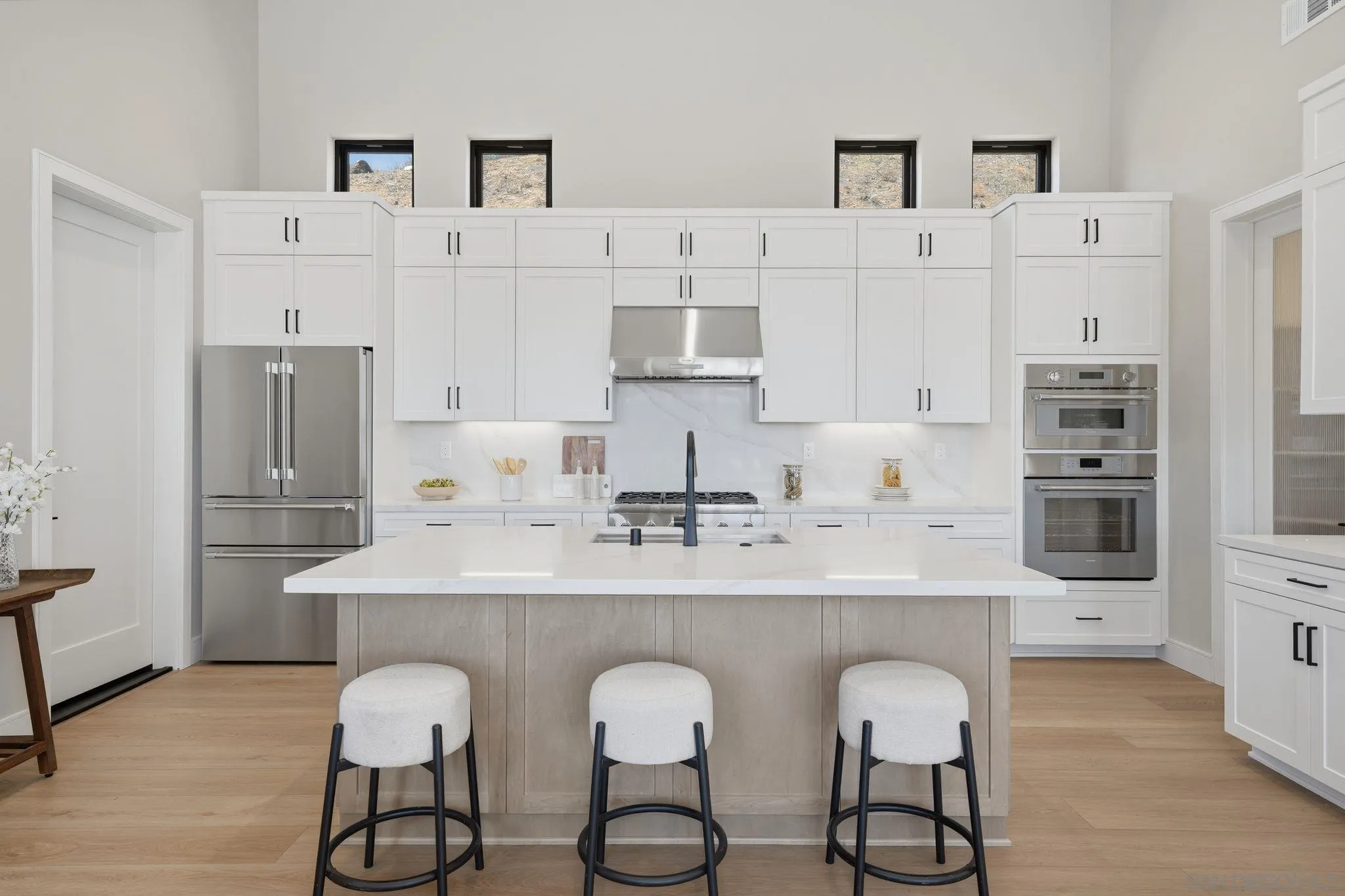 3916 Citrus Drive Fallbrook, CA 92028 - Photo 13 of 72 a kitchen with stainless steel appliances a sink and cabinets