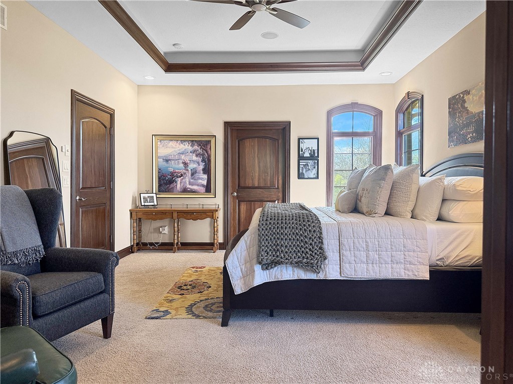 4096 Middle Urbana Road Urbana, OH 43078 - Photo 93 of 96 This spacious bedroom offers high ceilings and large windows, creating an inviting and airy retreat.