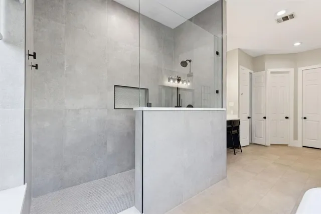 a view of a bathroom with shower