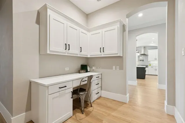 a view of a kitchen with electric appliances