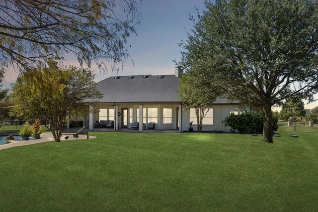 a view of a building with a big yard