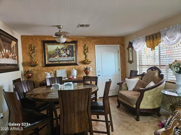 a view of a dining room with furniture