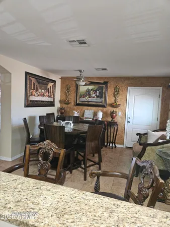 a living room with furniture window and piano