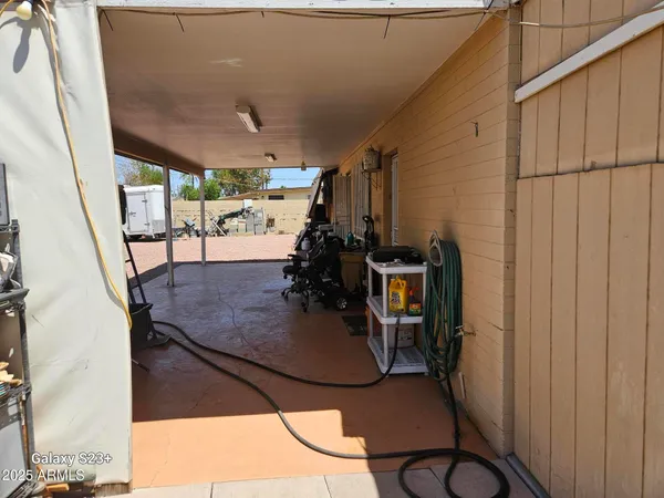 a view of a livingroom with furniture and window