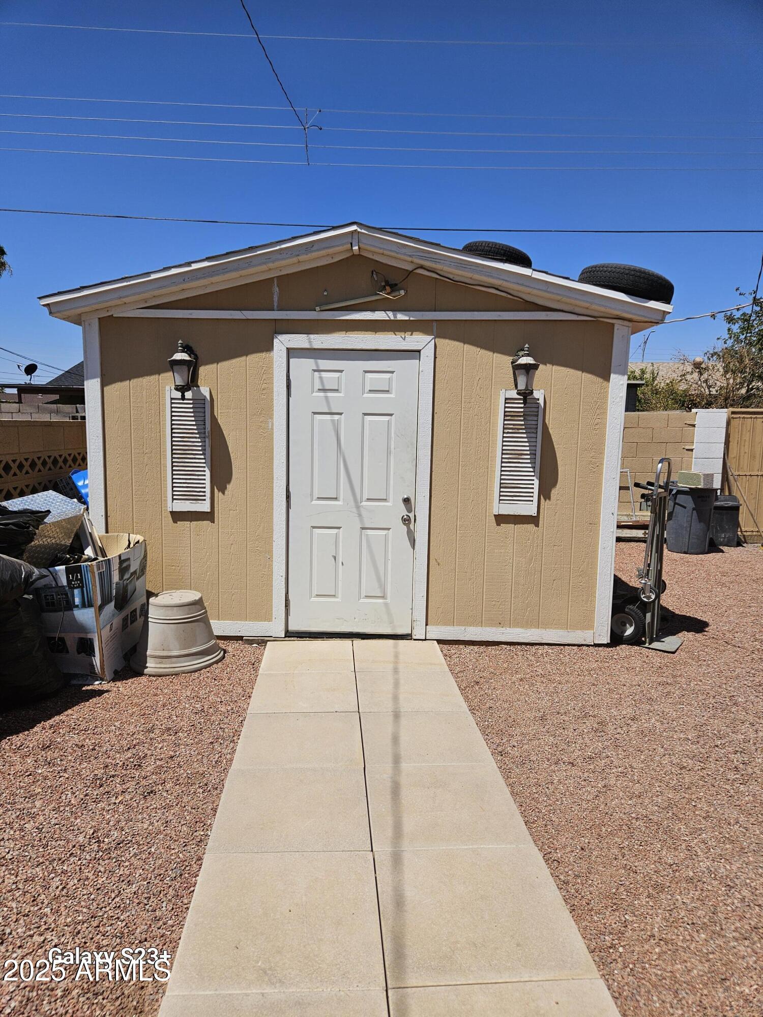 3020 North 40th Avenue Phoenix, AZ 85019 - Photo 7 of 36 a view of a car garage with a car parked