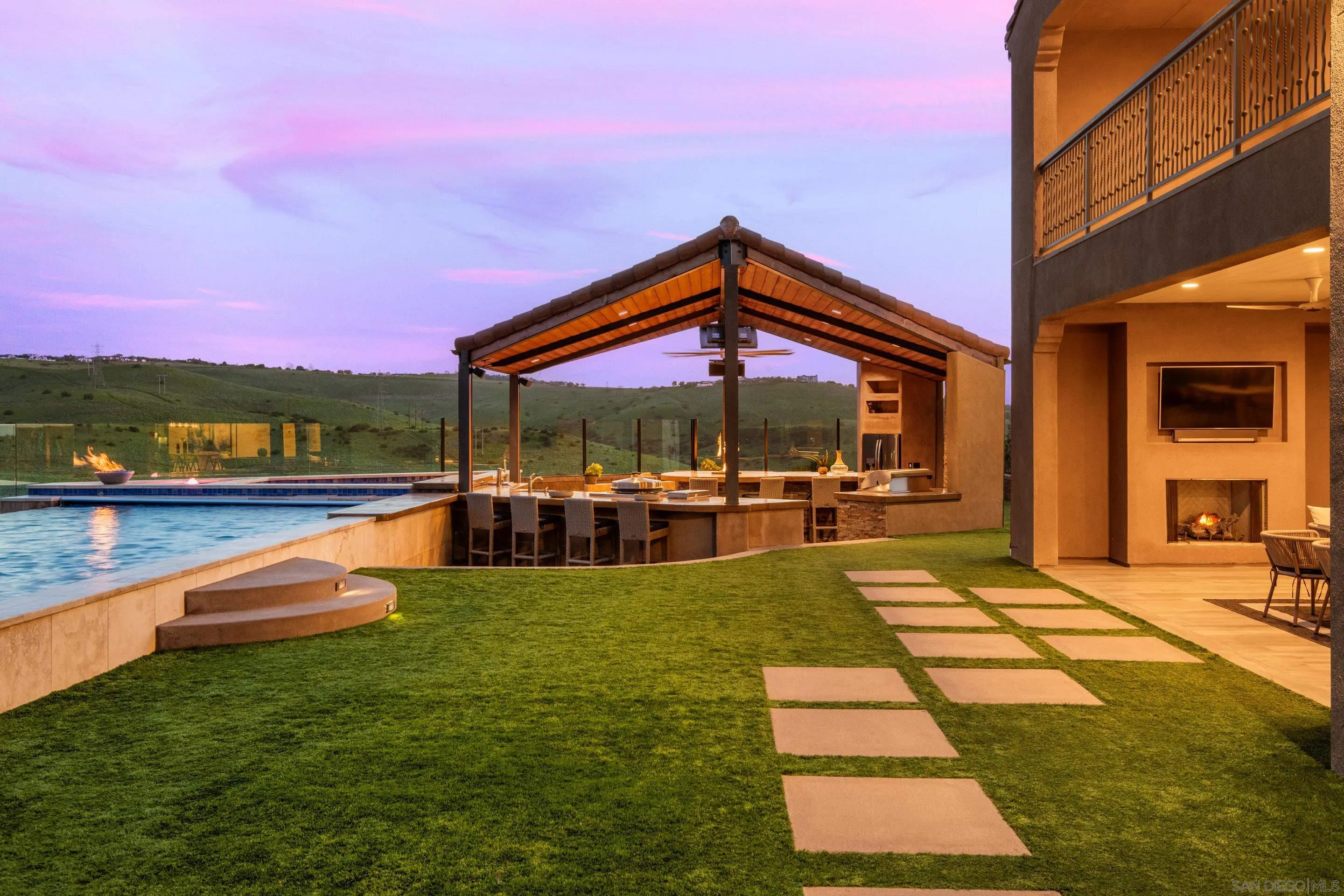 16339 Nicole Ridge Road San Diego, CA 92127 - Photo 20 of 56 a view of swimming pool with outdoor seating and a yard