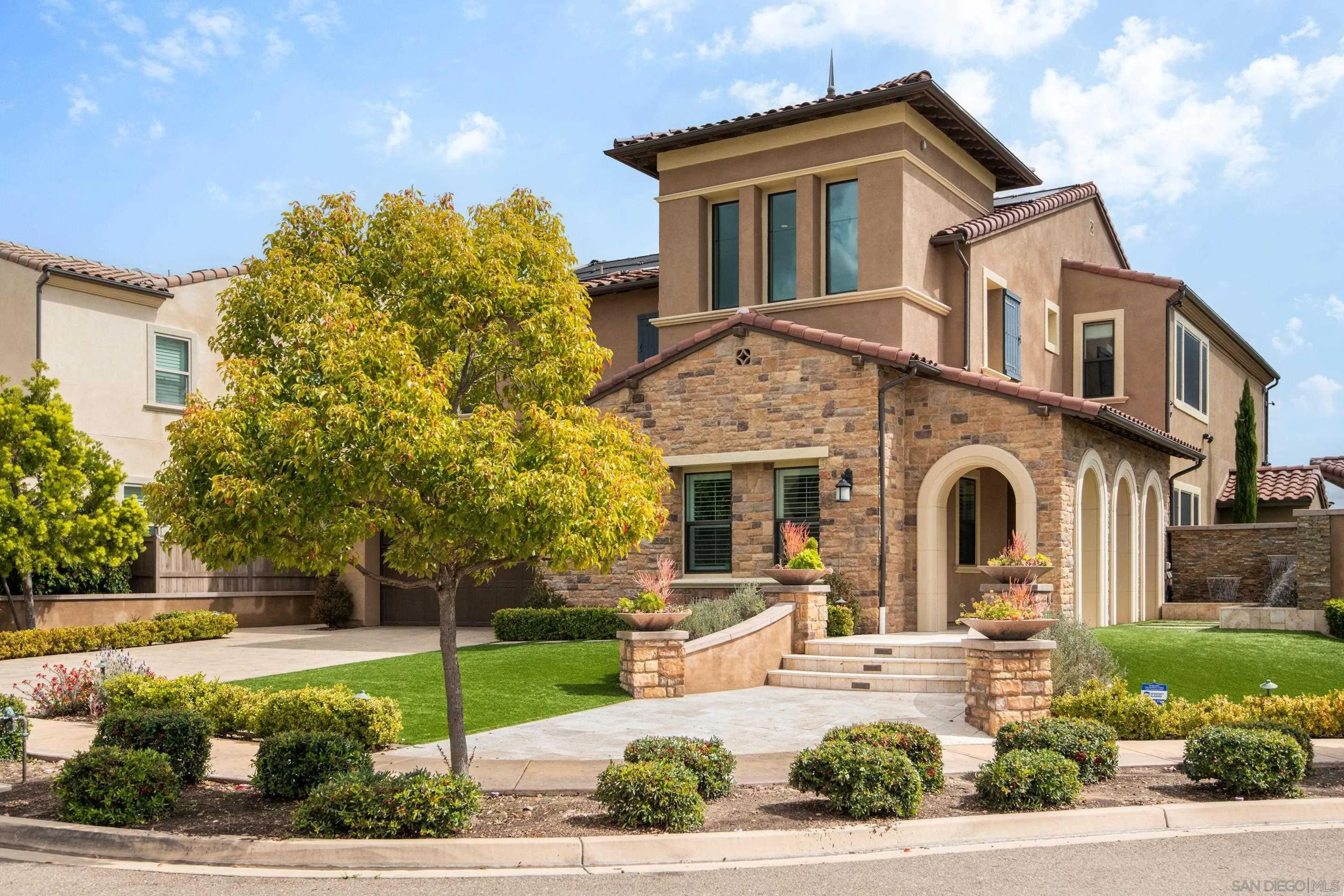 16339 Nicole Ridge Road San Diego, CA 92127 - Photo 2 of 56 a front view of a house with a yard