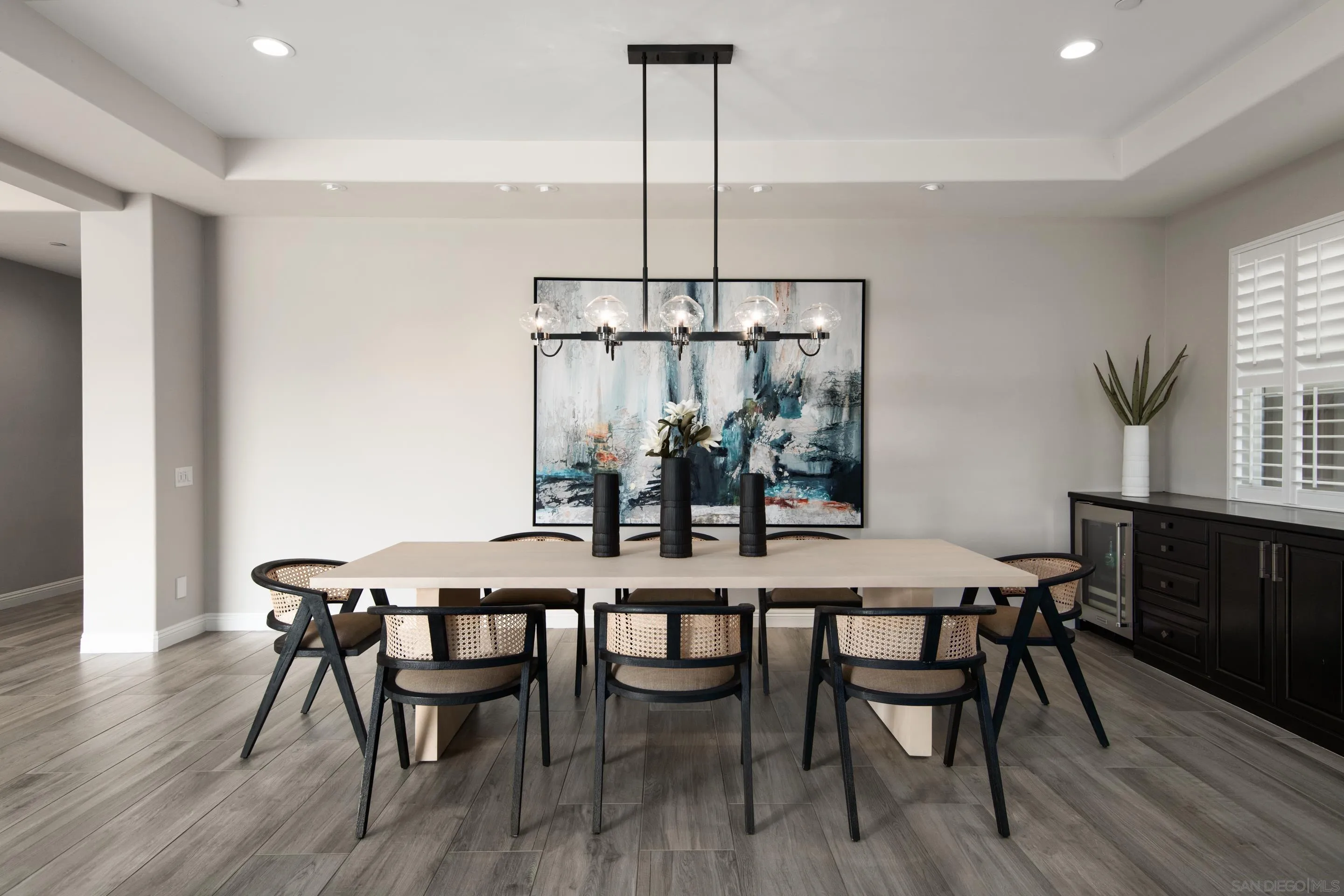 16339 Nicole Ridge Road San Diego, CA 92127 - Photo 26 of 56 a view of a dining room with furniture and wooden floor