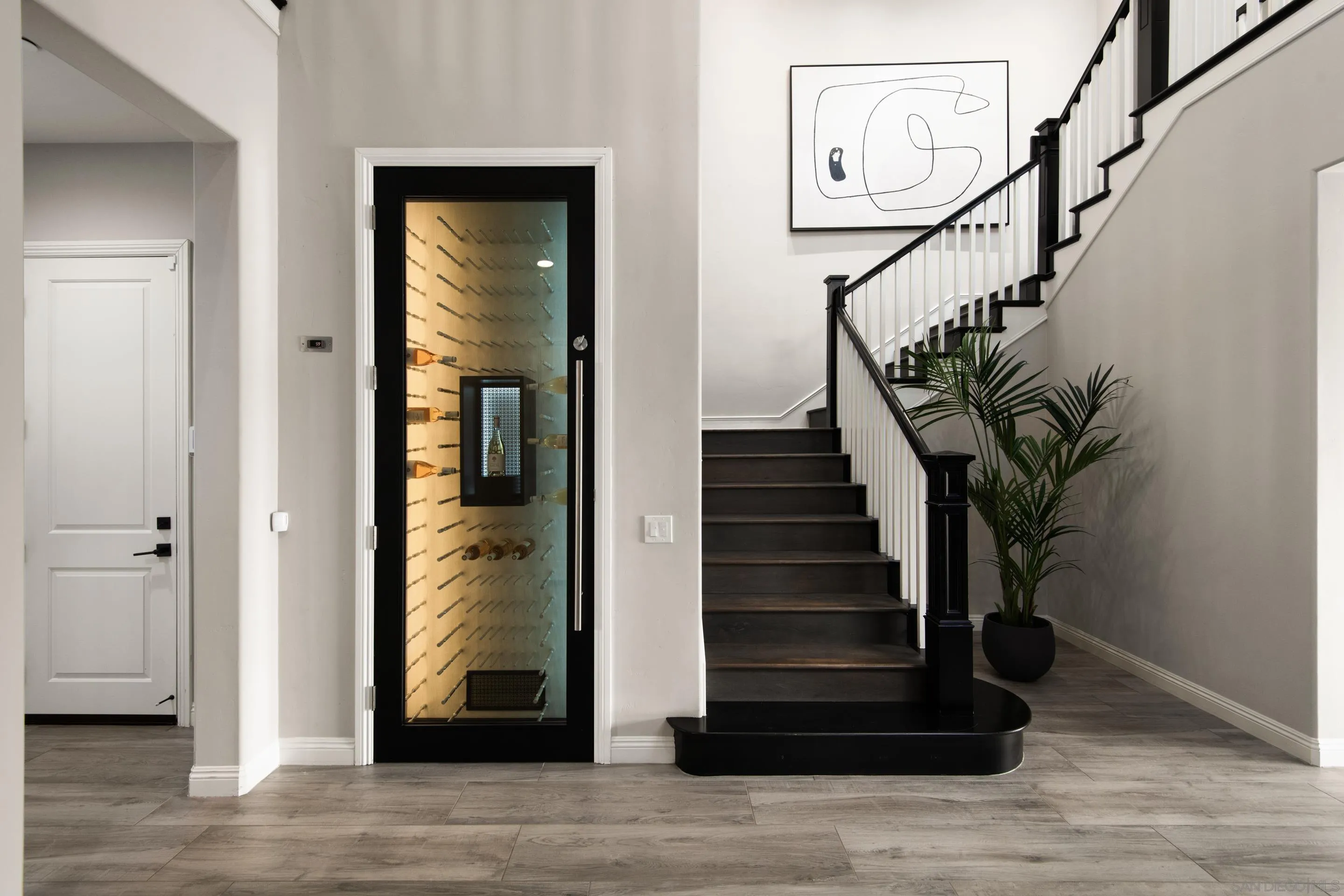 16339 Nicole Ridge Road San Diego, CA 92127 - Photo 3 of 56 a view of entryway and hall with wooden floor
