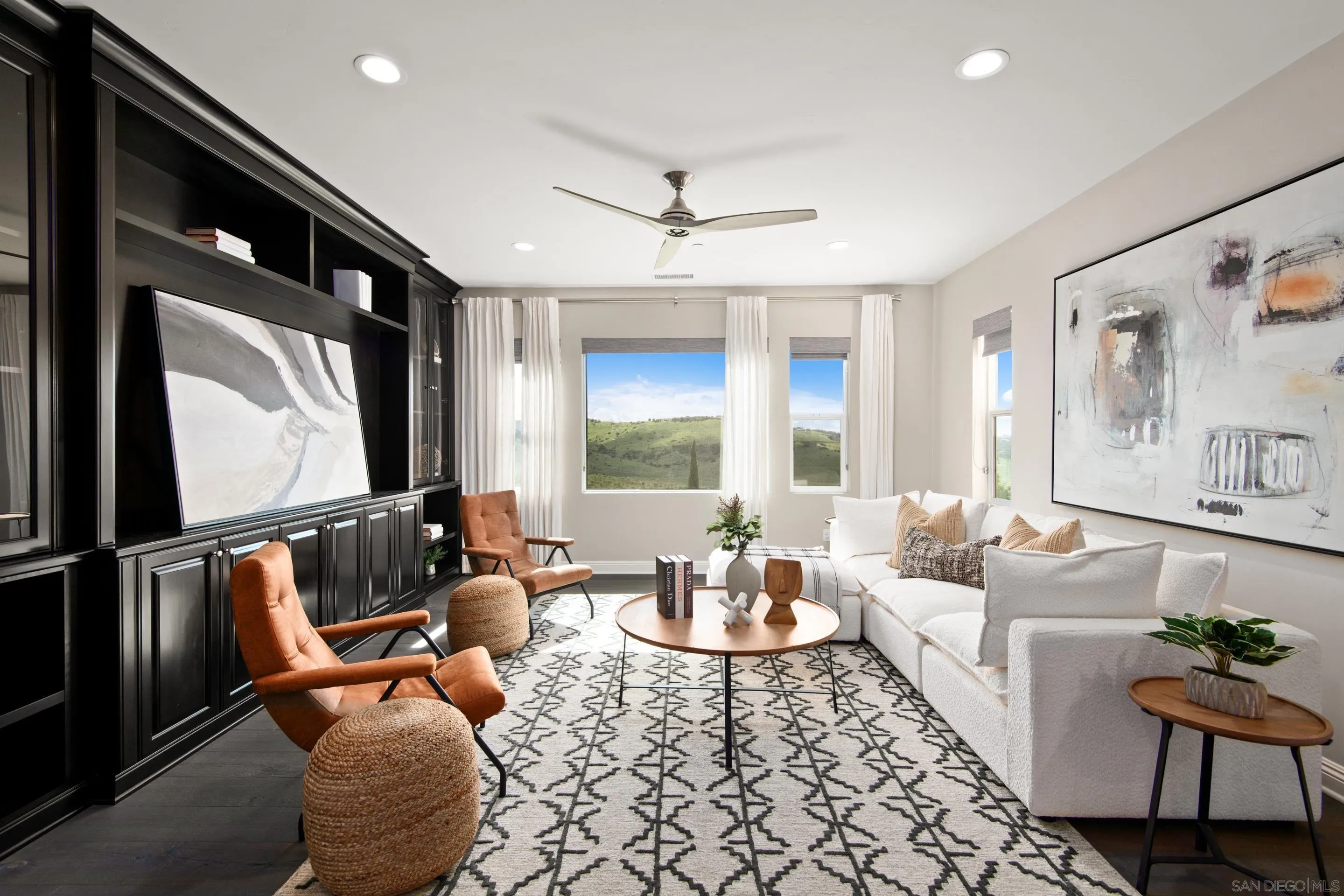 16339 Nicole Ridge Road San Diego, CA 92127 - Photo 35 of 56 a living room with furniture and a large window