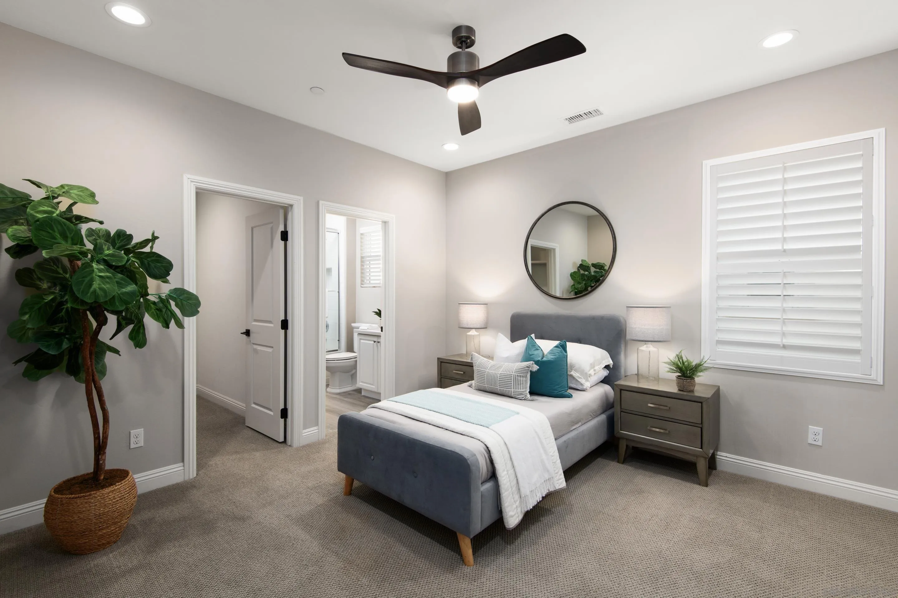 16339 Nicole Ridge Road San Diego, CA 92127 - Photo 37 of 56 a bedroom with a bed and a potted plant