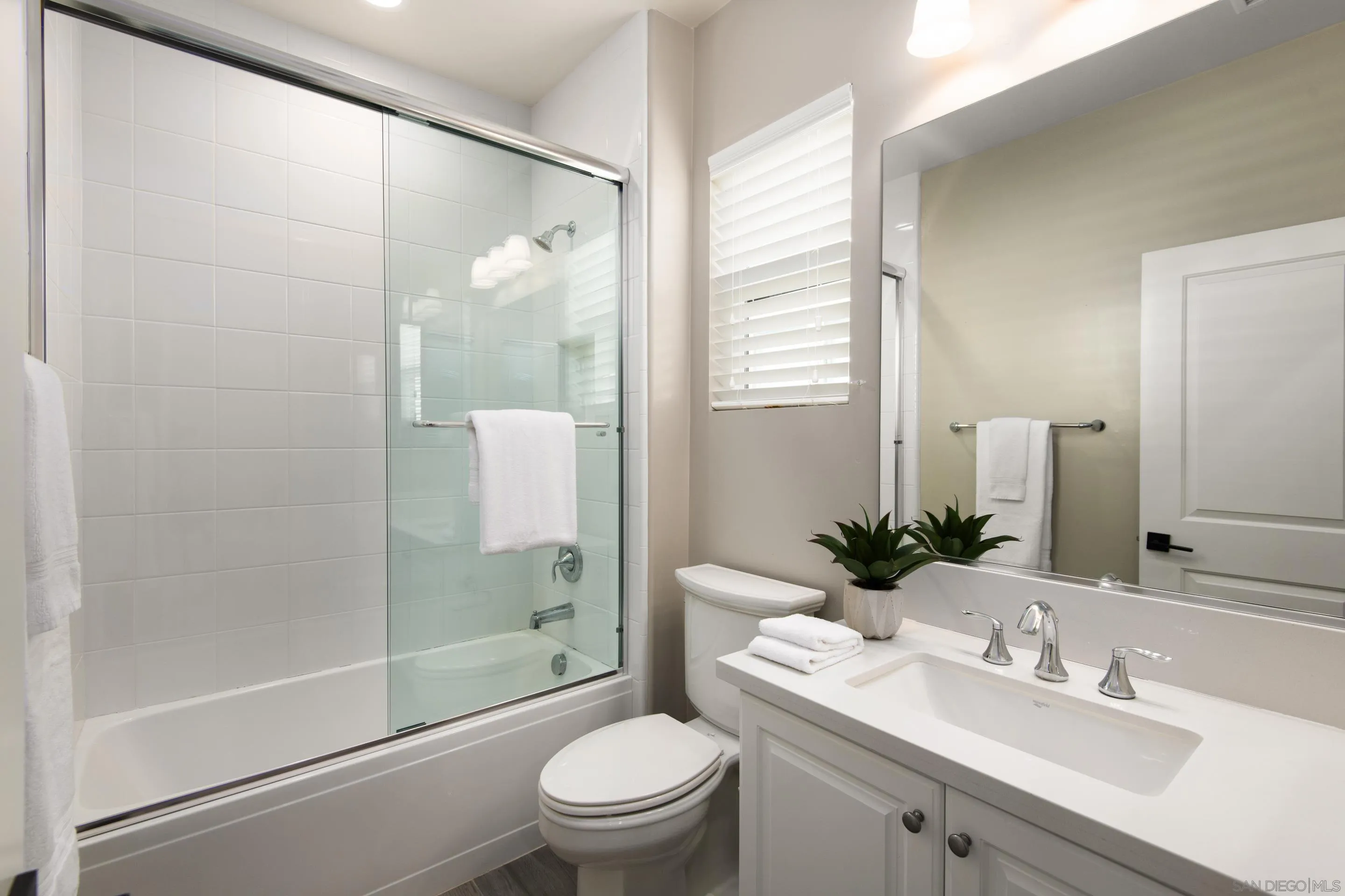 16339 Nicole Ridge Road San Diego, CA 92127 - Photo 39 of 56 a bathroom with a sink a toilet and shower