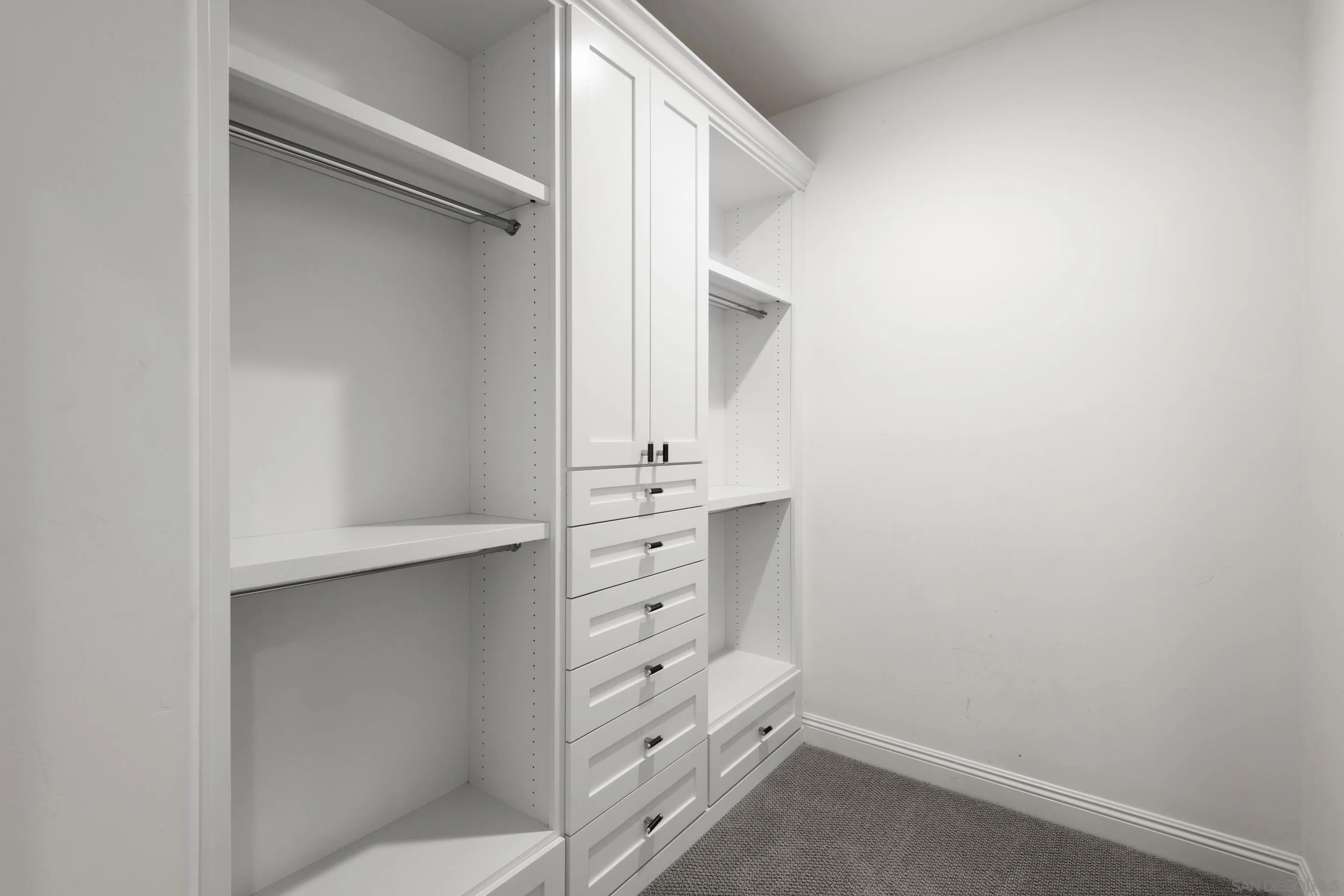 16339 Nicole Ridge Road San Diego, CA 92127 - Photo 40 of 56 a bathroom with a sink a toilet and a mirror