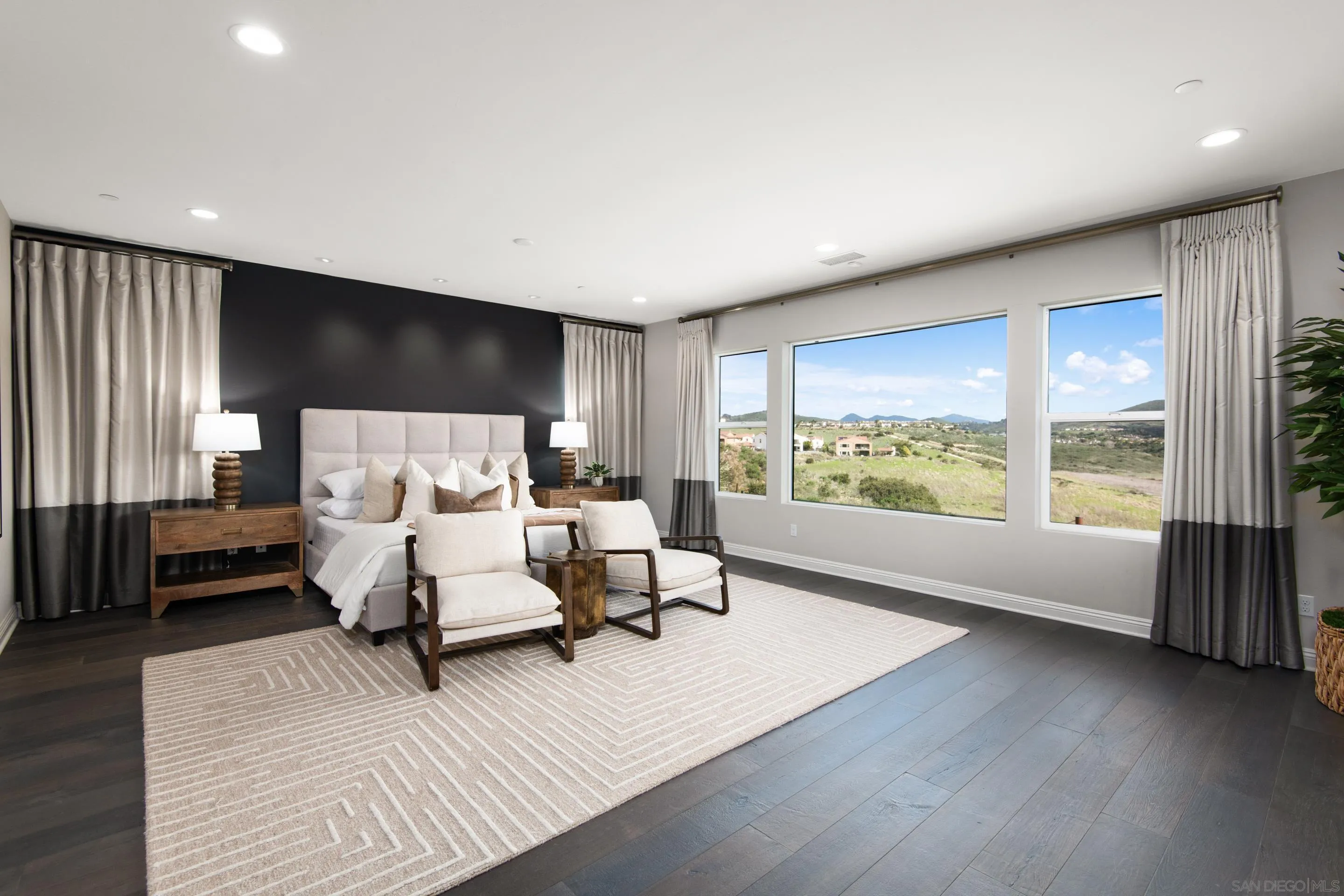 16339 Nicole Ridge Road San Diego, CA 92127 - Photo 42 of 56 a bedroom with a bed and large window