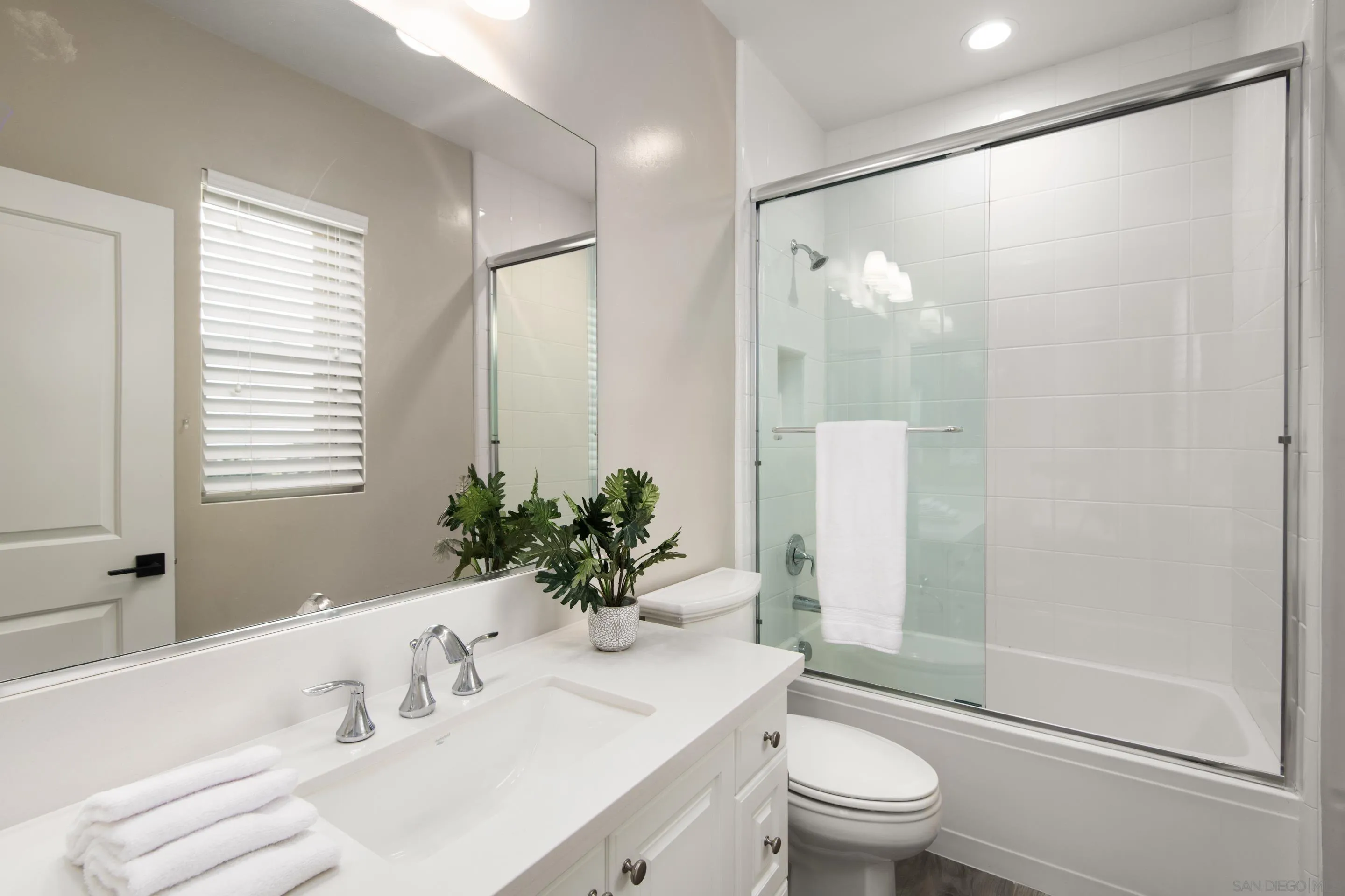 16339 Nicole Ridge Road San Diego, CA 92127 - Photo 49 of 56 a bathroom with a sink a toilet and shower