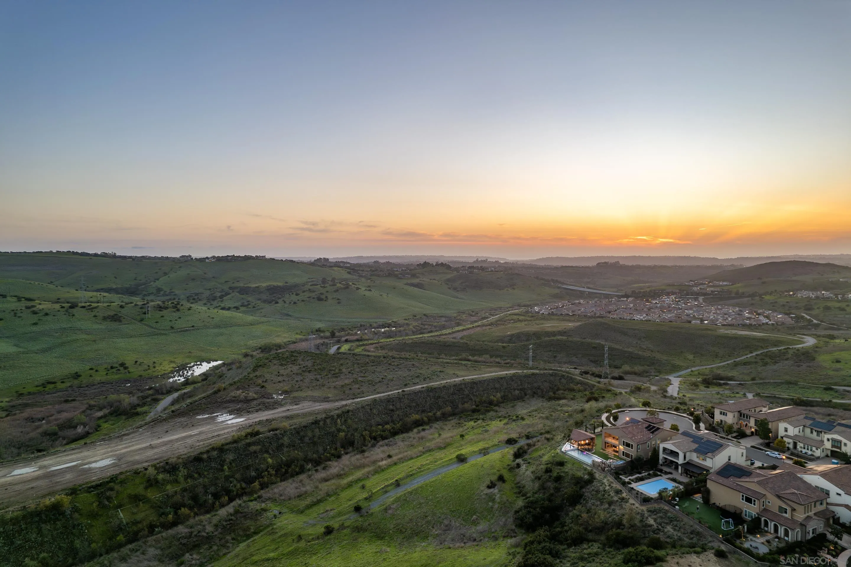 16339 Nicole Ridge Road San Diego, CA 92127 - Photo 54 of 56 a view of a street with mountains in the background
