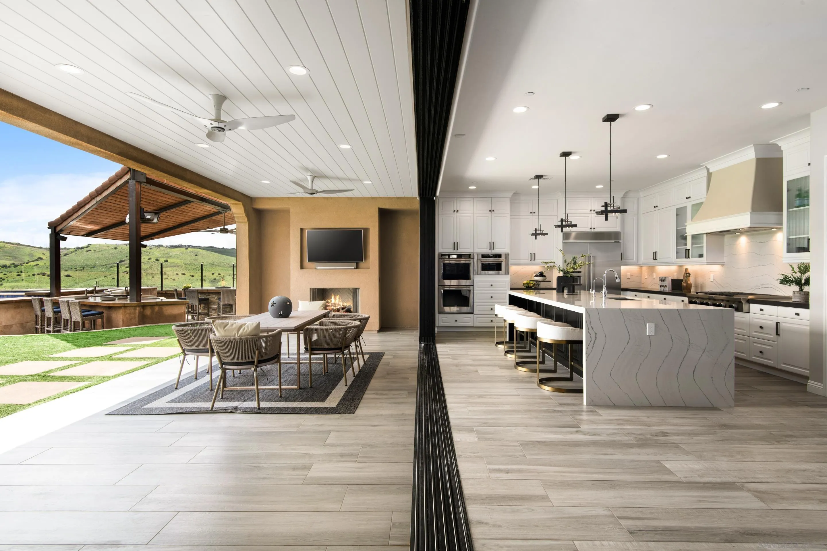 16339 Nicole Ridge Road San Diego, CA 92127 - Photo 8 of 56 a living room with fireplace furniture and a large window