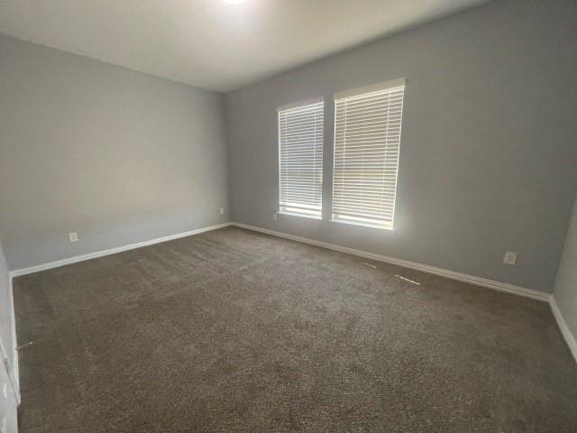 938 Genesis Road Rice, TX 75155 - Photo 12 of 13 an empty room with a window