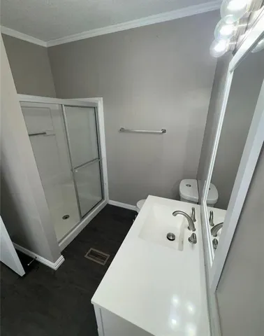 a bathroom with a bathtub and shower