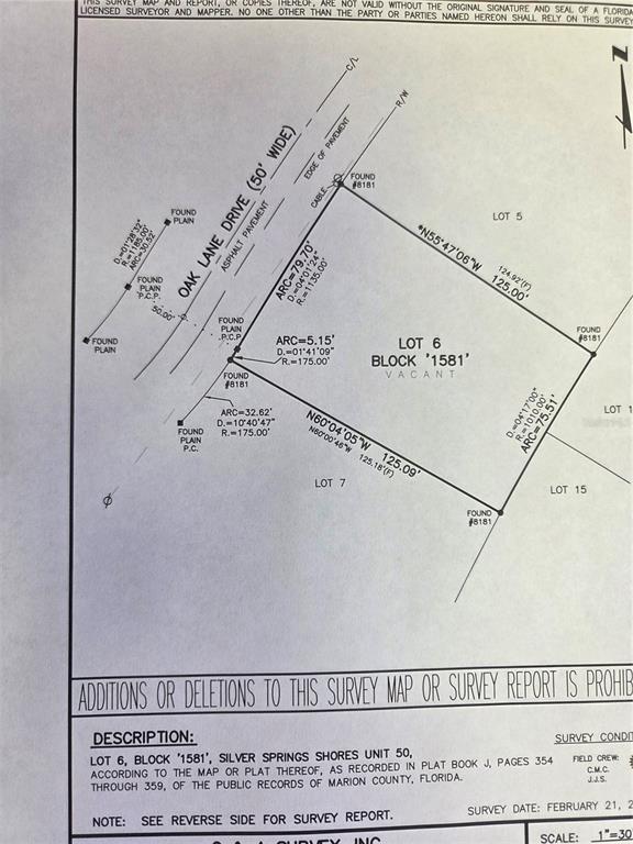Southwest Oak Lane Dr Lane Ocala, FL 34472 - Photo 2 of 5 a picture of a book and a book in a field