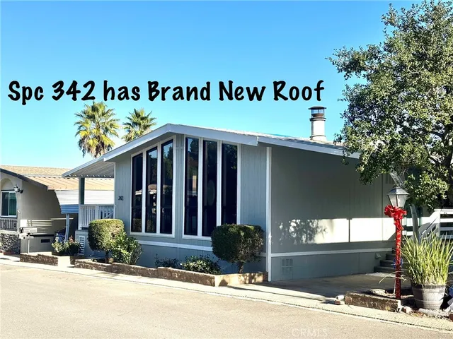 a view of a house with a street