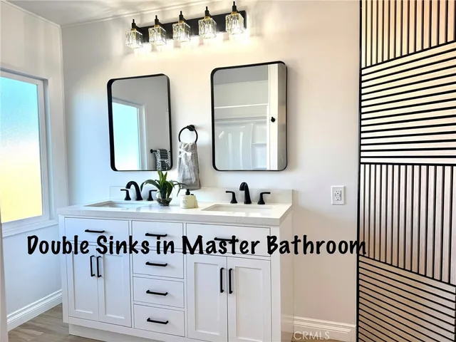 a view of a bathroom with a potted plant