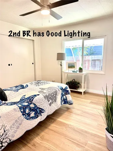 a bathroom with a double vanity sink mirror and toilet