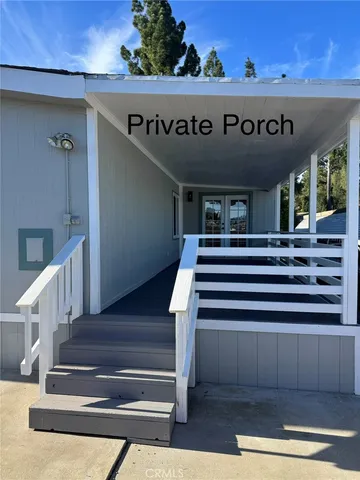 a view of kitchen with sink and a window