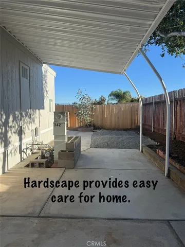 a view of a porch with wooden floor