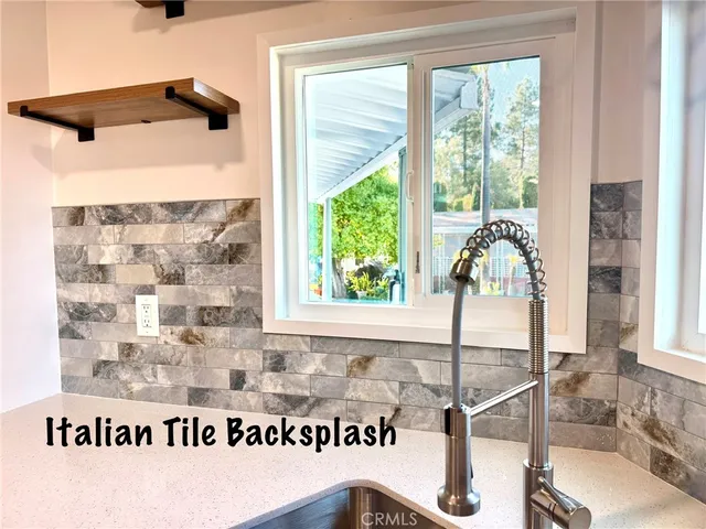 a picture of a bathroom with a bathtub