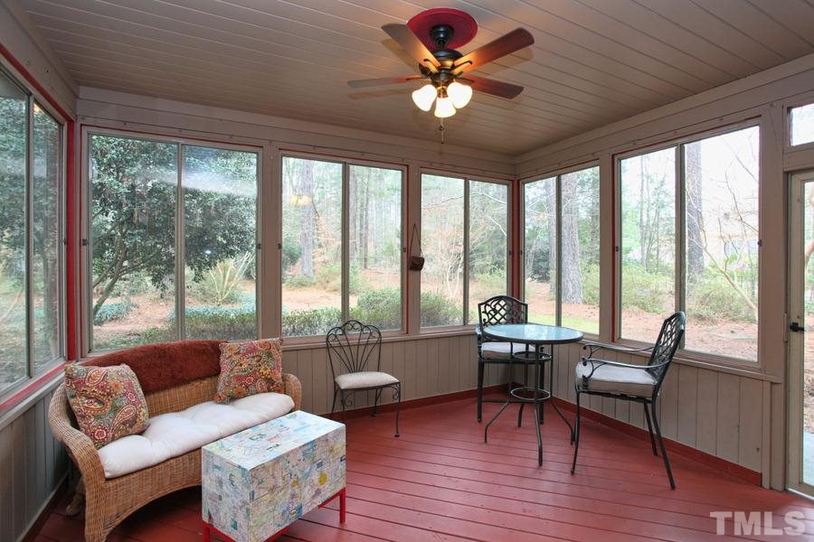 2812 Patrie Place Raleigh, NC 27613 - Photo 22 of 24 a living room with furniture and a large window