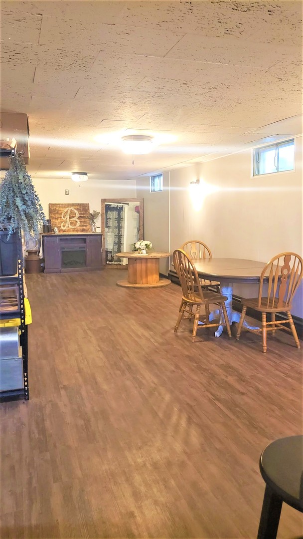 14375 Derby Line Road Genoa, IL 60135 - Photo 14 of 19 a view of a terrace with chairs
