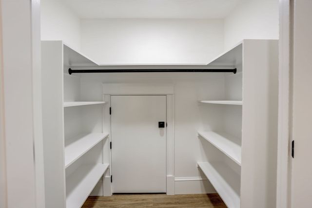 a view of an empty walk in closet