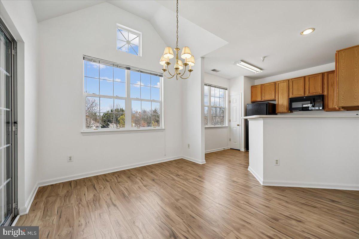 12700 Found Stone Road, Unit 206 Germantown, MD 20876 - Photo 11 of 38 Separate Dining Room with Vaulted Ceiling