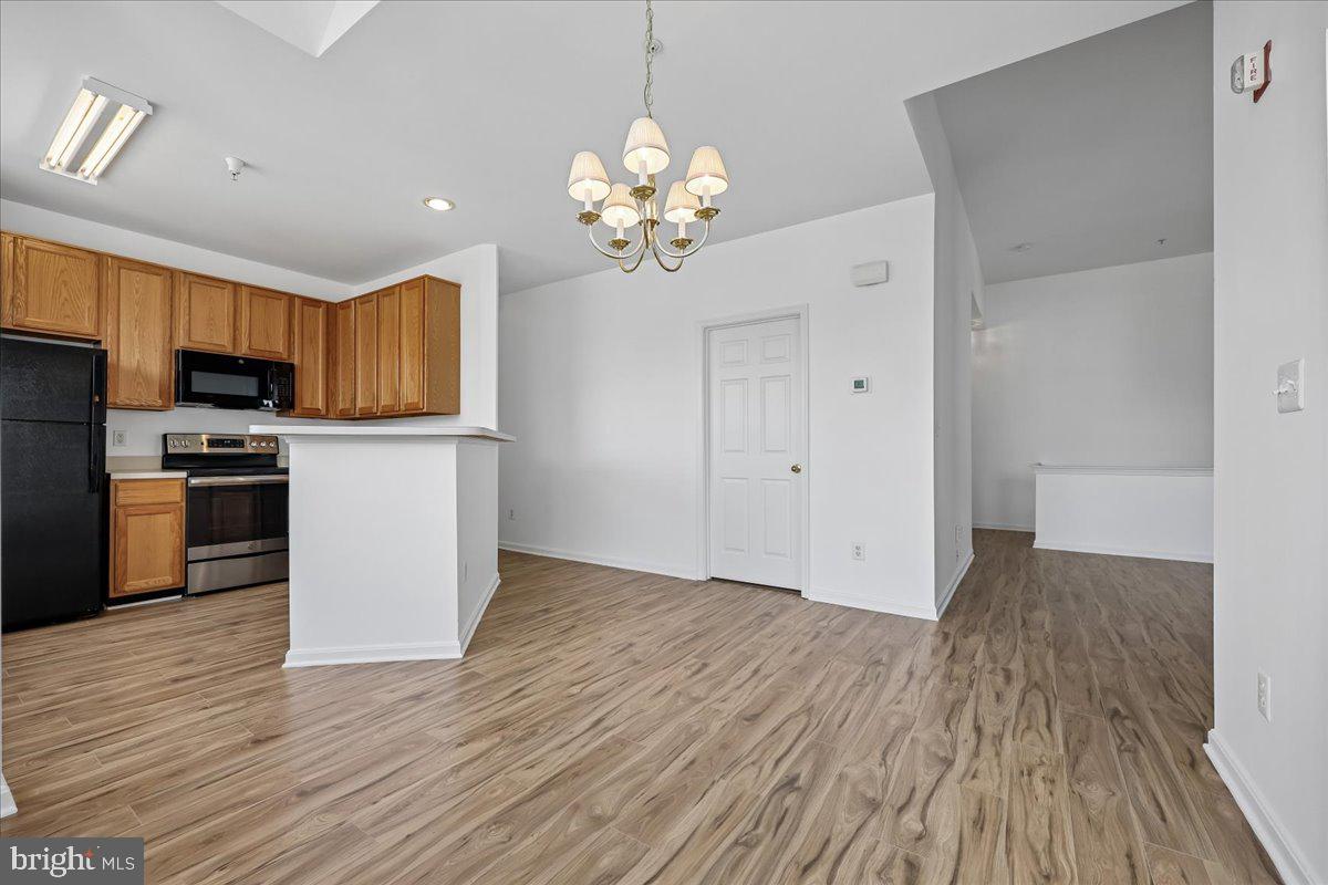 12700 Found Stone Road, Unit 206 Germantown, MD 20876 - Photo 12 of 38 Separate Dining Room opens to the Kitchen